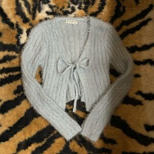 Light blue front tie long sleeve sweater